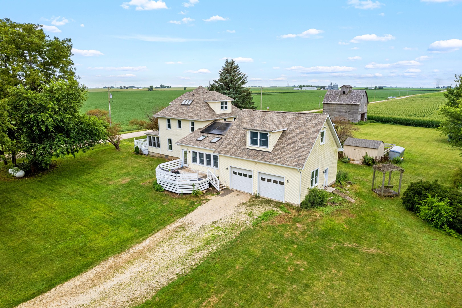 3705 Elva Road Malta, IL 60150 - Photo 5 of 42 an aerial view of a house with a garden