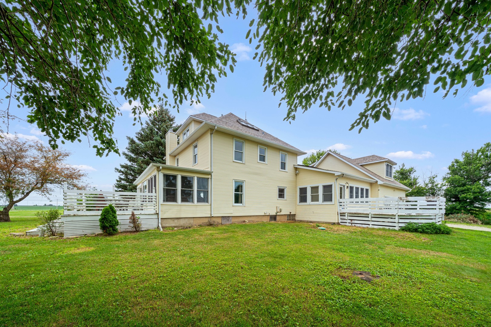 3705 Elva Road Malta, IL 60150 - Photo 6 of 42 a view of a house with a backyard