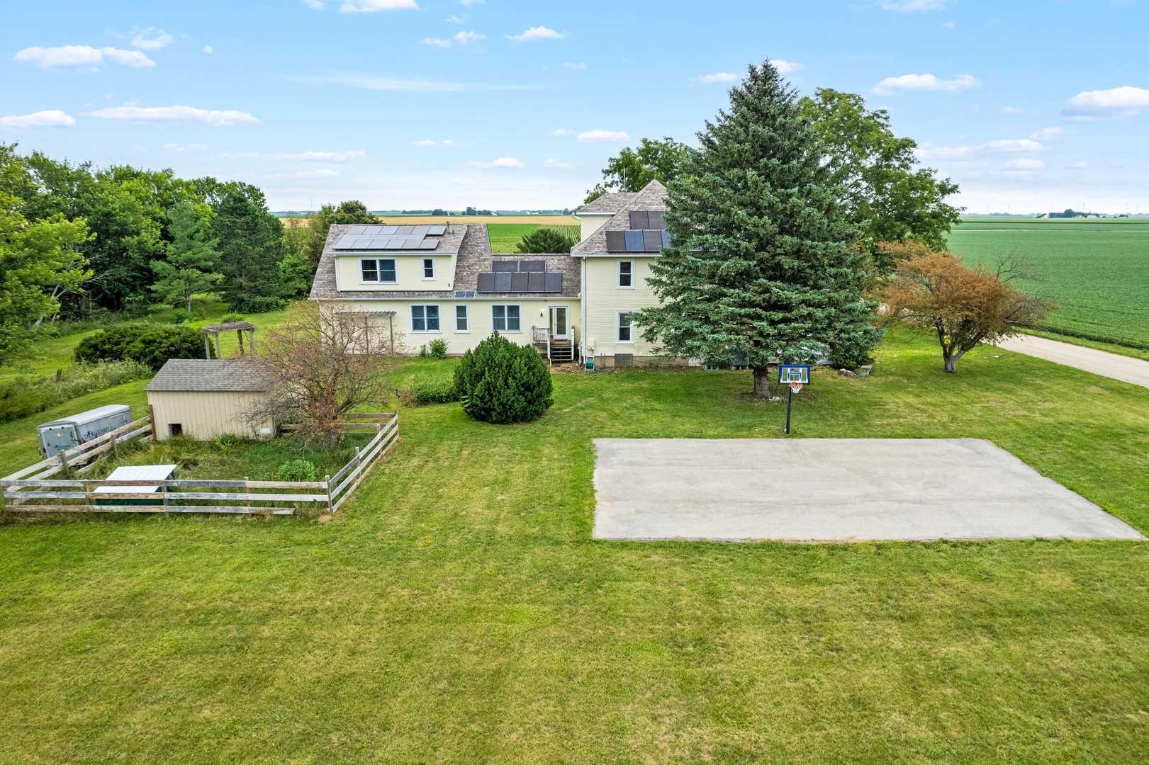 3705 Elva Road Malta, IL 60150 - Photo 8 of 42 a front view of a house with a yard