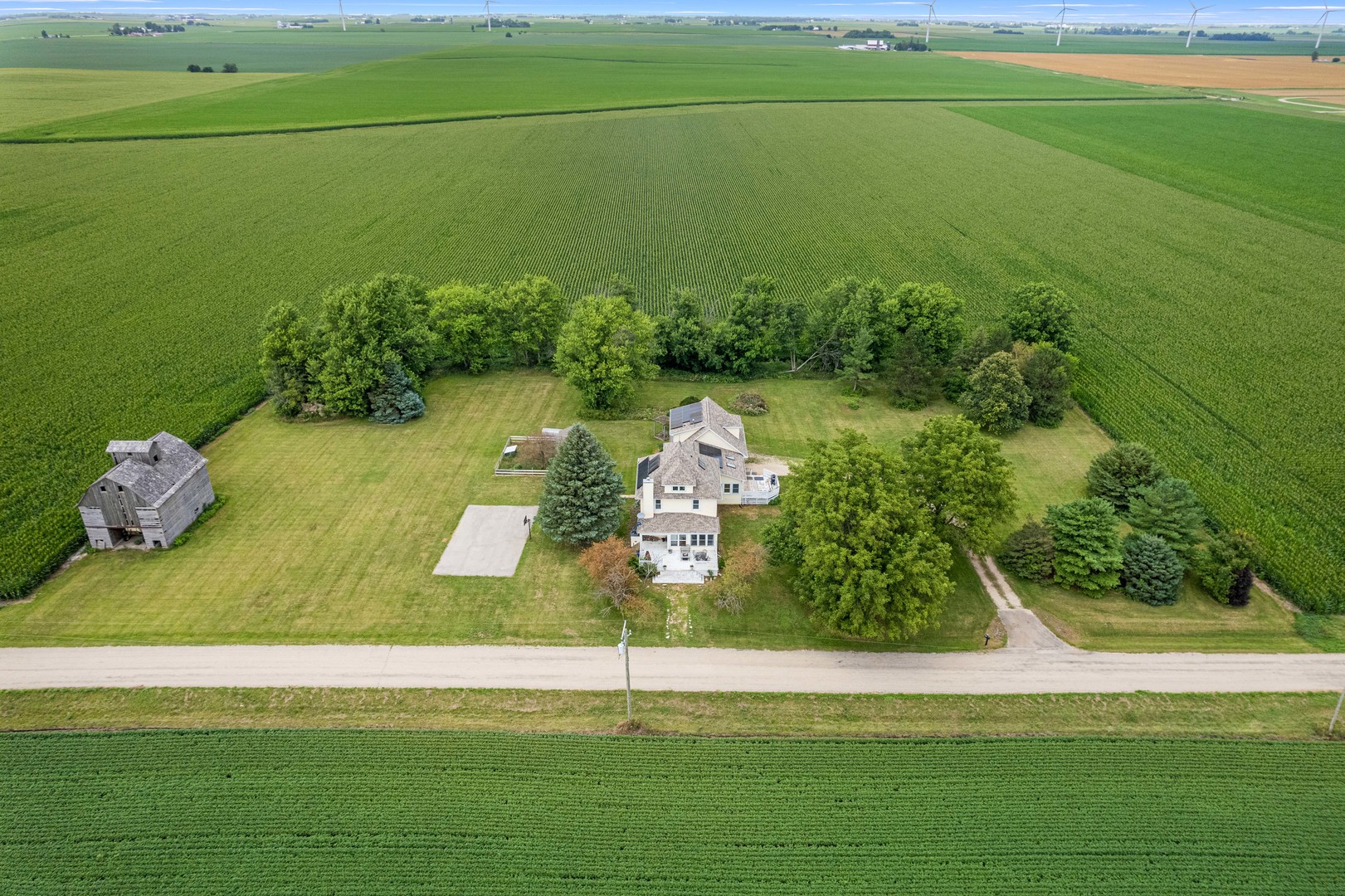 3705 Elva Road Malta, IL 60150 - Photo 9 of 42 a view of a lake with a yard