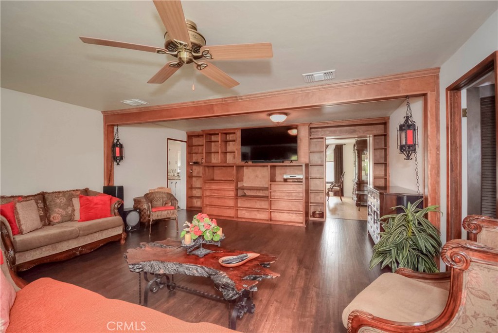 962 West 41st Street San Bernardino, CA 92407 - Photo 9 of 15 a living room with furniture and a flat screen tv