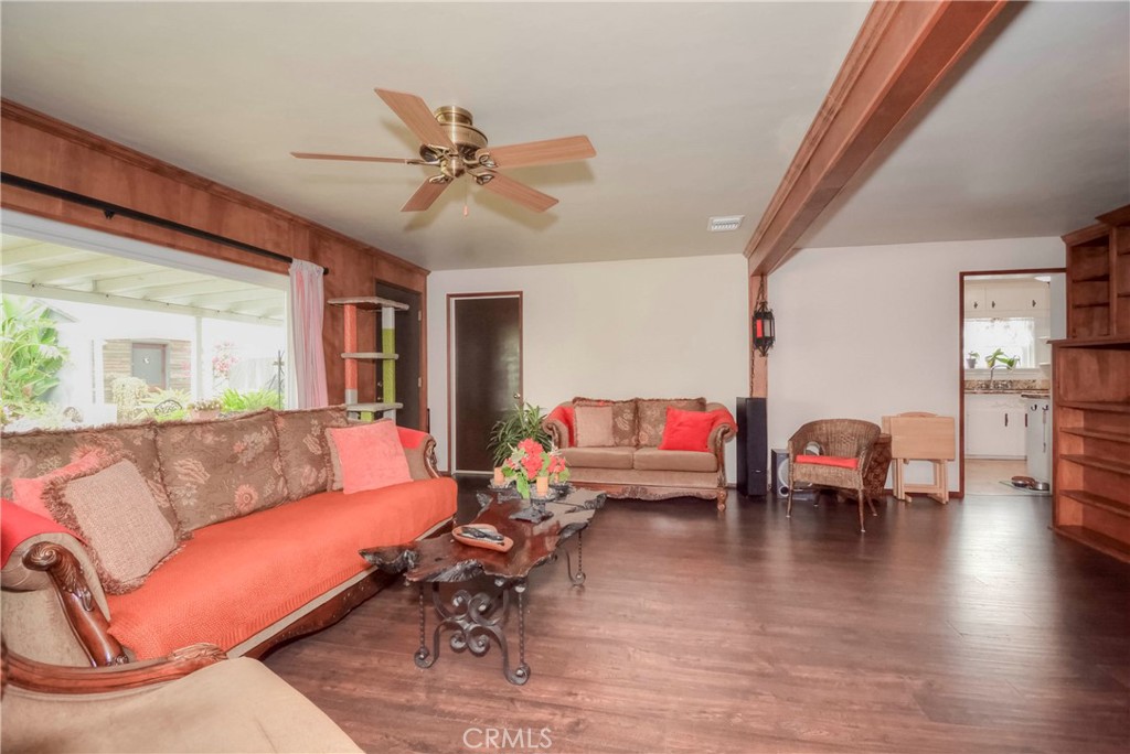 962 West 41st Street San Bernardino, CA 92407 - Photo 10 of 15 a living room with furniture and a wooden floor