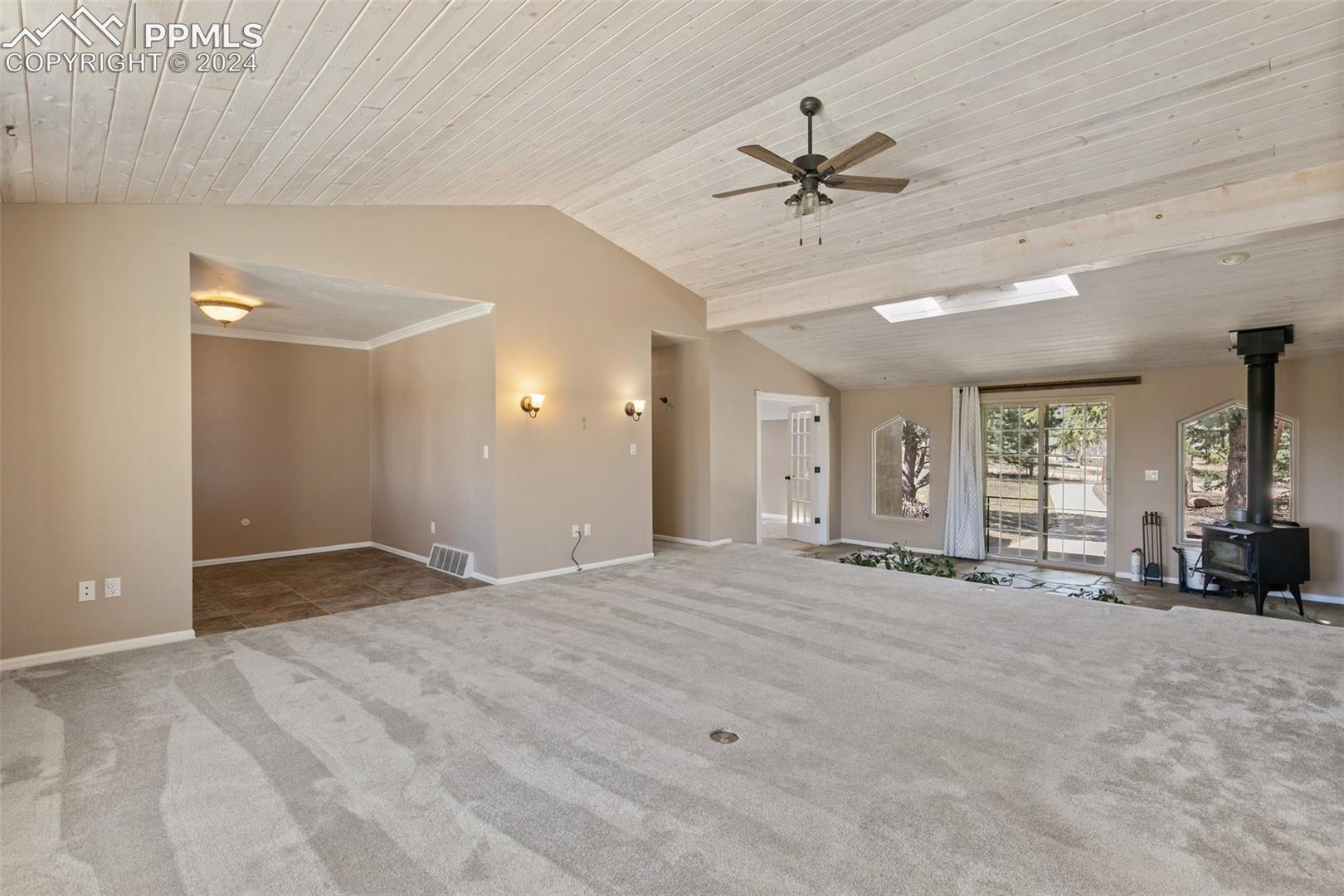 3830 Range View Road Monument, CO 80132 - Photo 17 of 50 Opposite living room view- Hallway to the right of entryway leads to master bedroom.