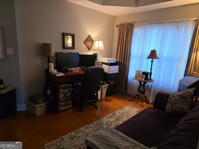 a workspace with furniture and lamp