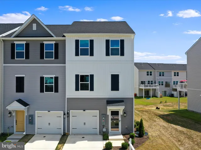 a front view of a house with swimming pool