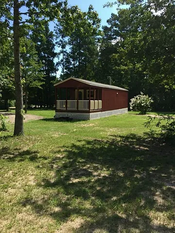 a view of a porch with a yard
