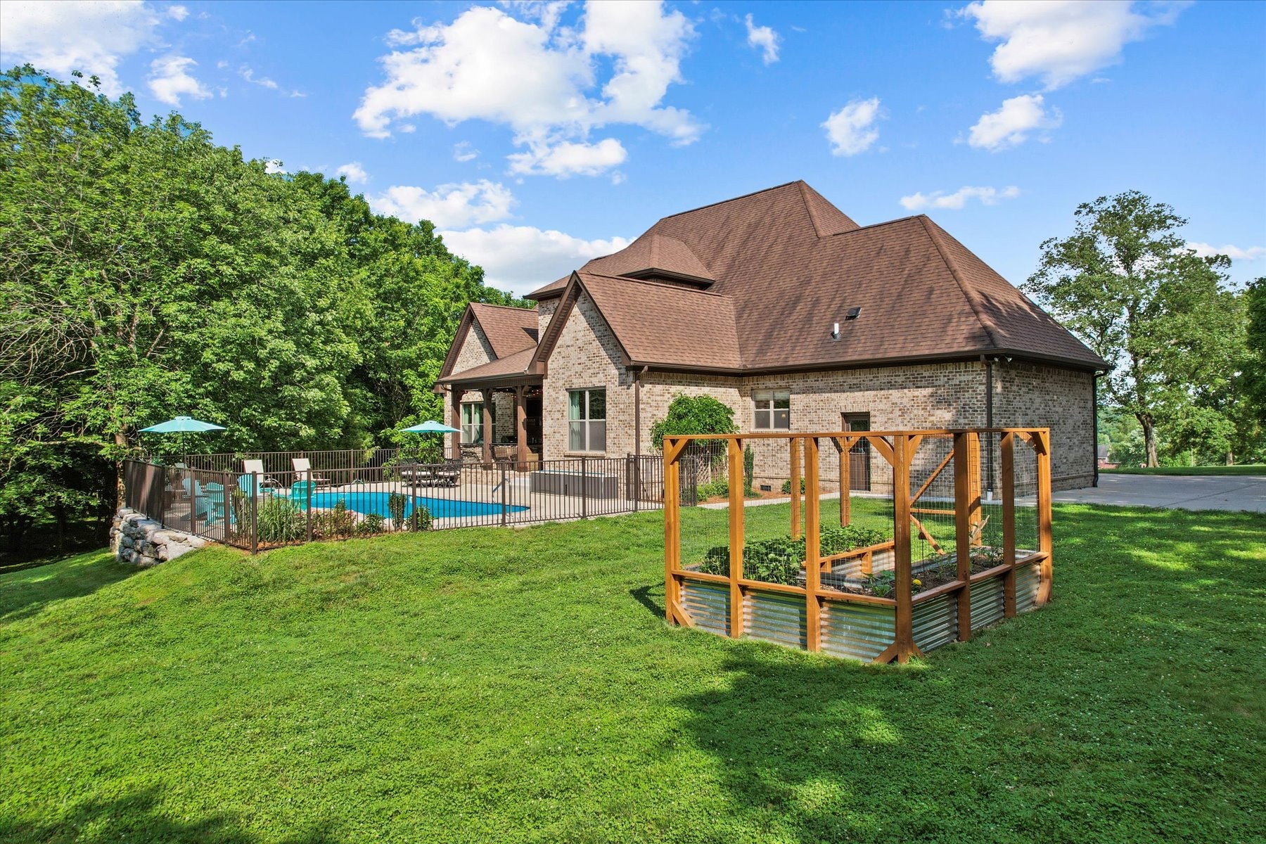 8311 Saundersville Road Mount Juliet, TN 37122 - Photo 13 of 70 a view of a house with a yard porch and sitting area