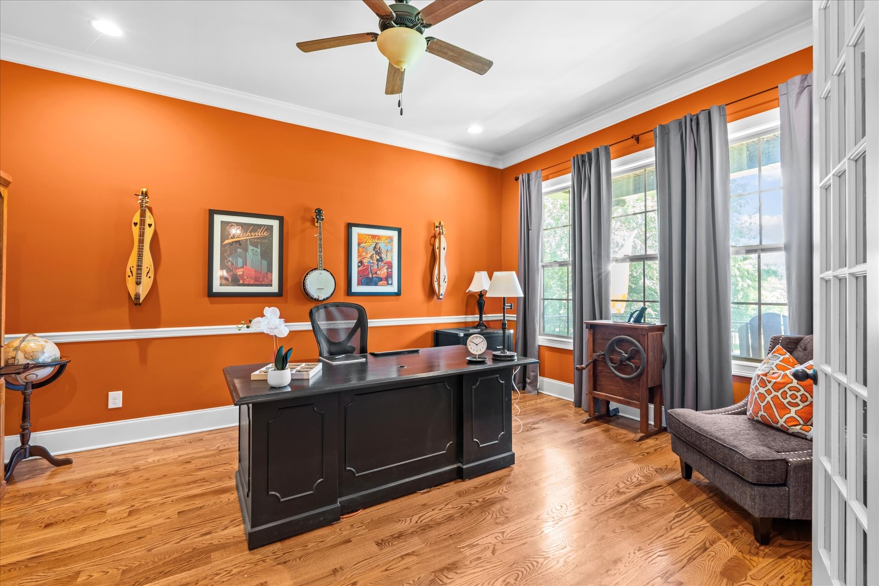 8311 Saundersville Road Mount Juliet, TN 37122 - Photo 17 of 70 a living room with furniture a rug and a chandelier