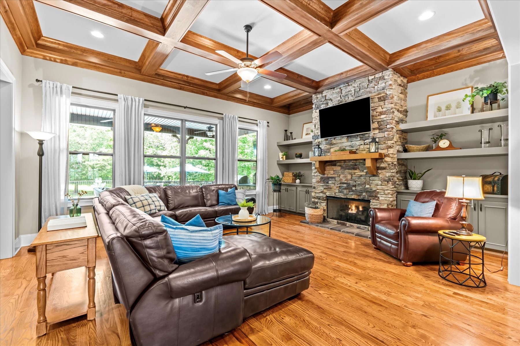 8311 Saundersville Road Mount Juliet, TN 37122 - Photo 22 of 70 a living room with fireplace furniture and a flat screen tv
