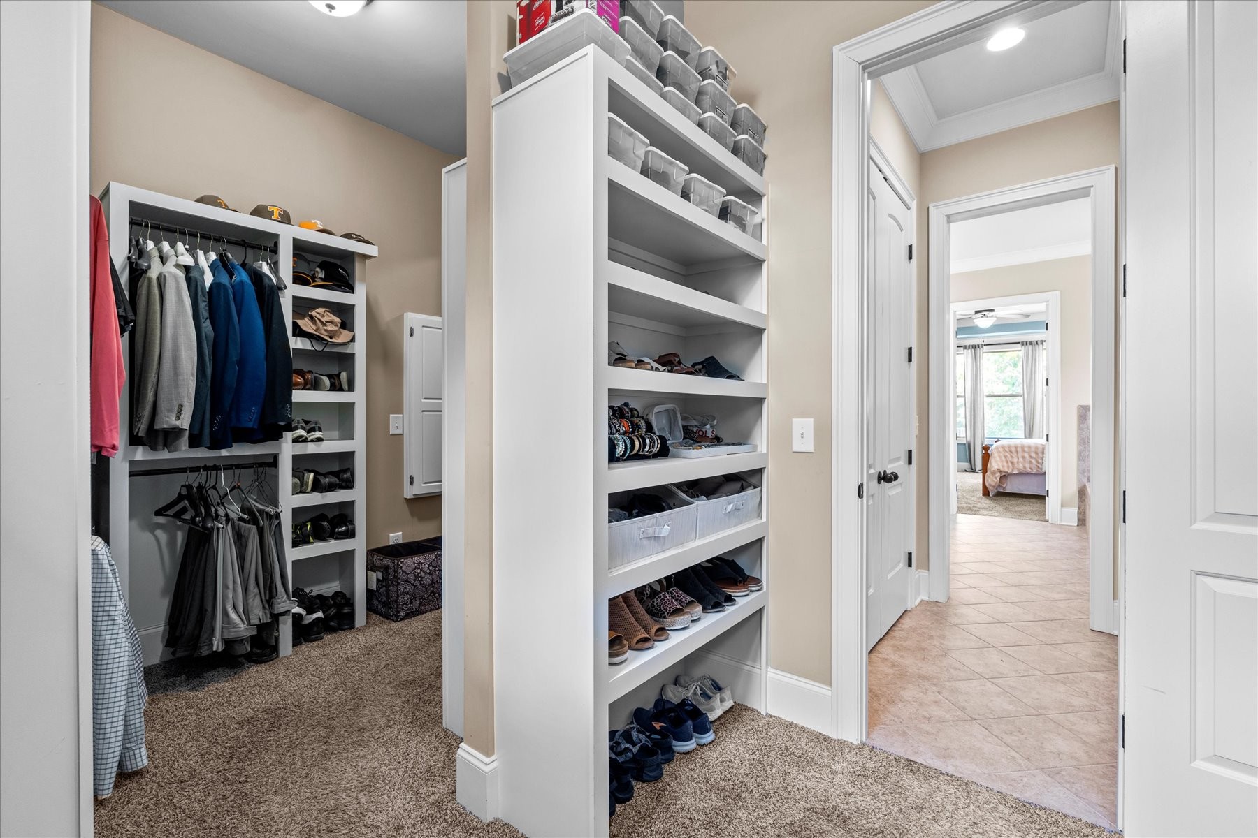 8311 Saundersville Road Mount Juliet, TN 37122 - Photo 49 of 70 a view of walk in closet with clothes and shoes