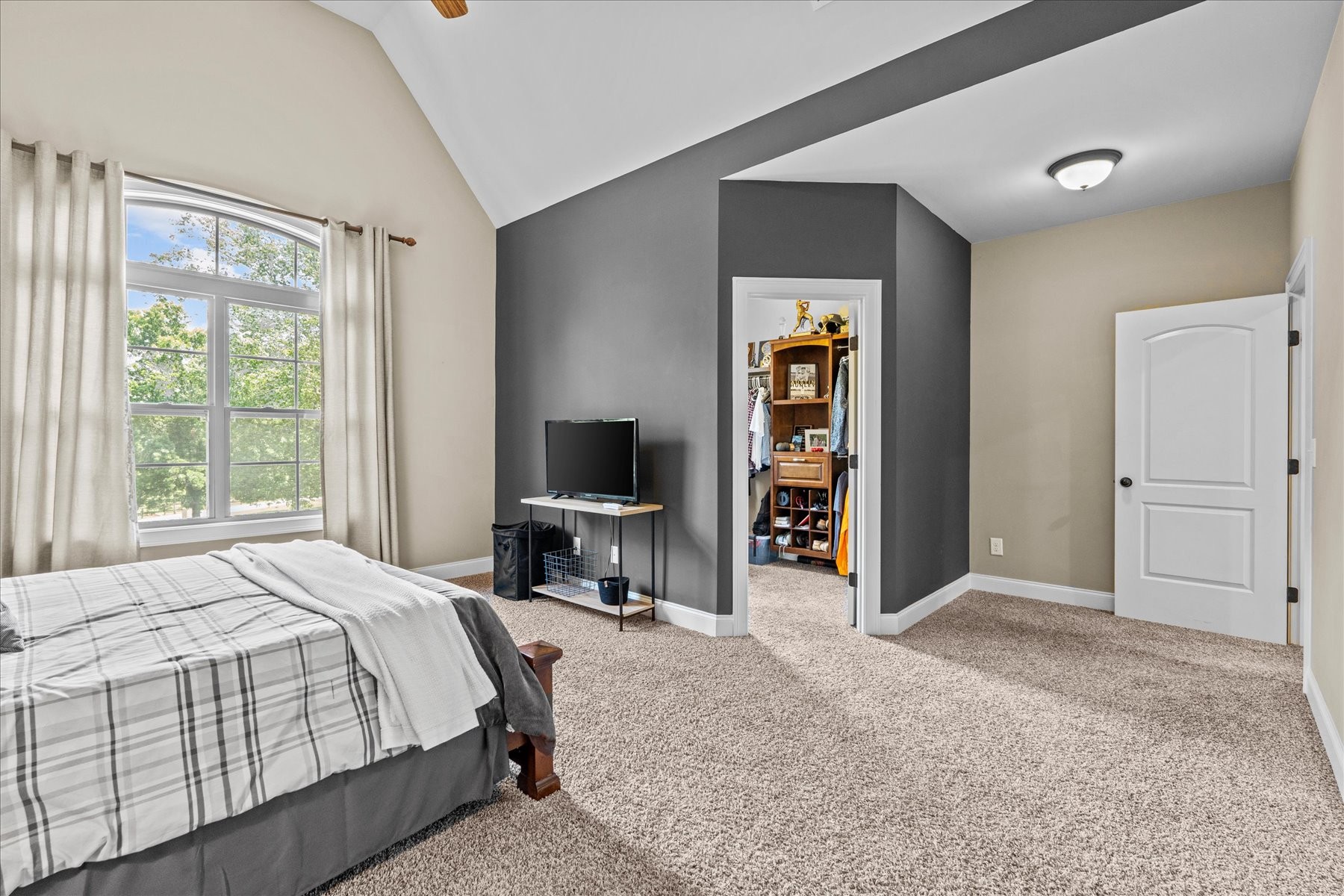 8311 Saundersville Road Mount Juliet, TN 37122 - Photo 56 of 70 a bedroom with a bed and a flat screen tv