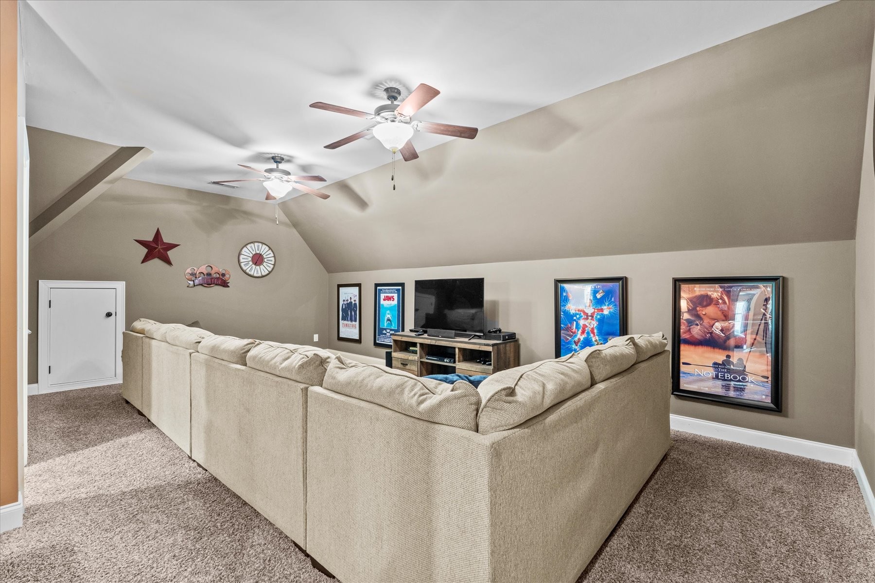 8311 Saundersville Road Mount Juliet, TN 37122 - Photo 57 of 70 a living room with furniture and a flat screen tv