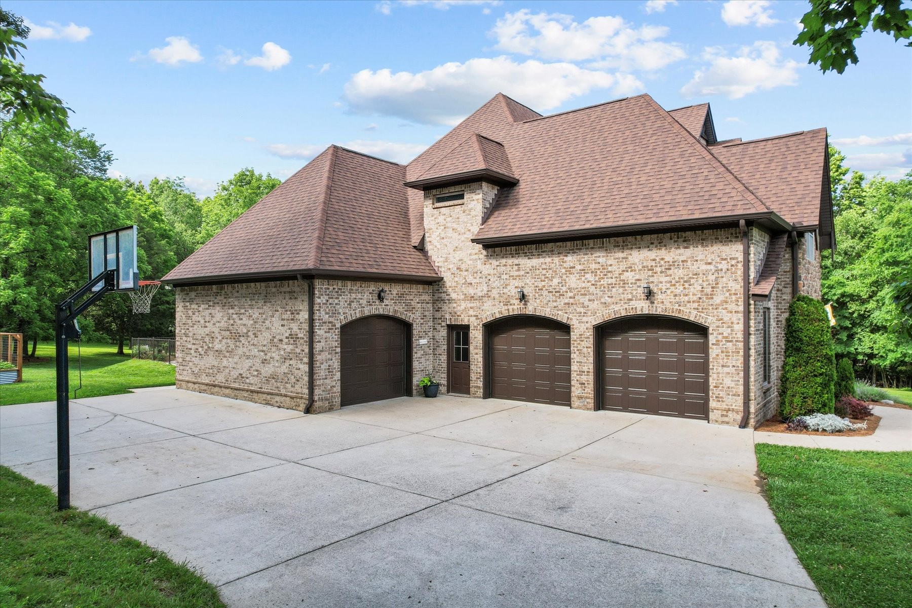 8311 Saundersville Road Mount Juliet, TN 37122 - Photo 62 of 70 a view of a house with a yard and large tree
