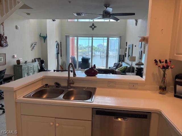 2743 First Street, Unit 104 Fort Myers, FL 33916 - Photo 17 of 32 a kitchen with a sink and a potted plant