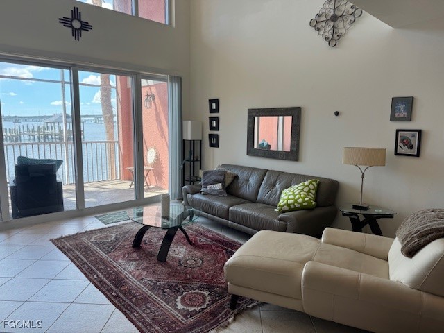 2743 First Street, Unit 104 Fort Myers, FL 33916 - Photo 8 of 32 a living room with furniture and a large window