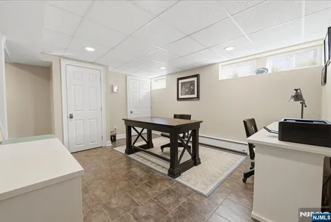 a workspace with furniture and white walls