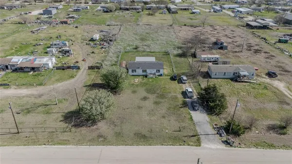 an aerial view of residential house and outdoor space