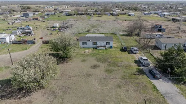 a view of roof with wooden floor and outdoor space