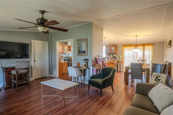 a bedroom with a bed and a mirror