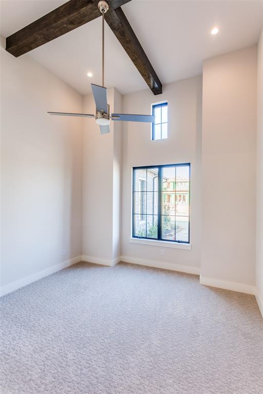 2108 Sicily Lane Haslet, TX 76052 - Photo 15 of 17 an empty room with windows and fan