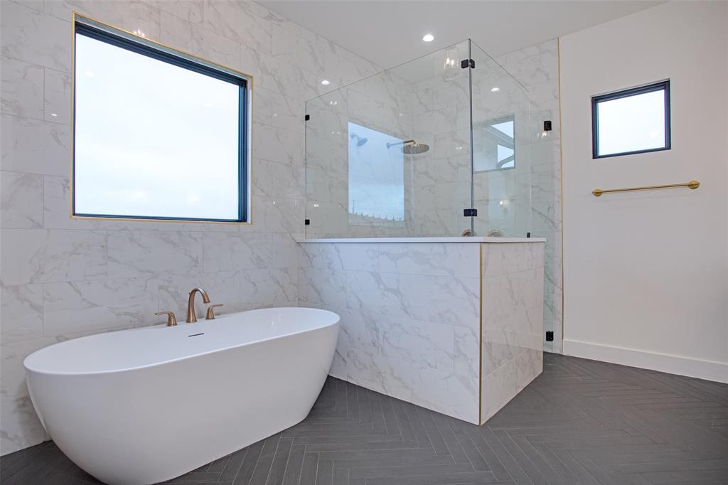 2108 Sicily Lane Haslet, TX 76052 - Photo 9 of 17 a bathroom with a bathtub and a sink