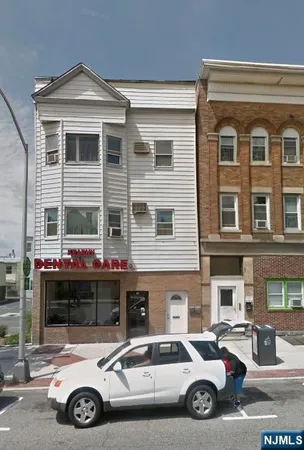 a car parked in front of a building