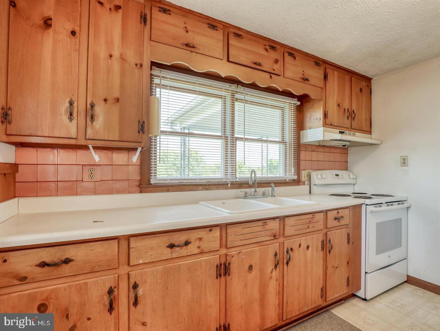 234 Gun Club Road Stephenson, VA 22656 - Photo 16 of 28 Kitchen has Great Wood Cabinets