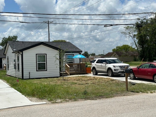 326 North Erskine Street Angleton, TX 77515 - Photo 10 of 10 a couple of cars parked in front of a house