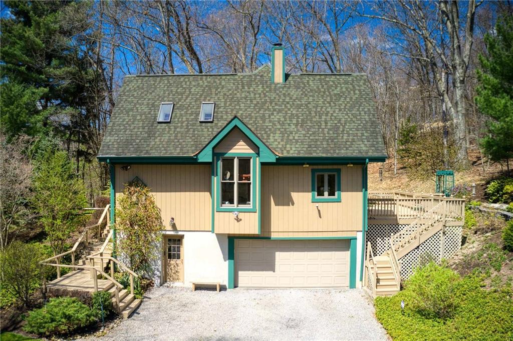 2430 Brandt School Road Wexford, PA 15090 - Photo 19 of 25 a front view of a house with a garage