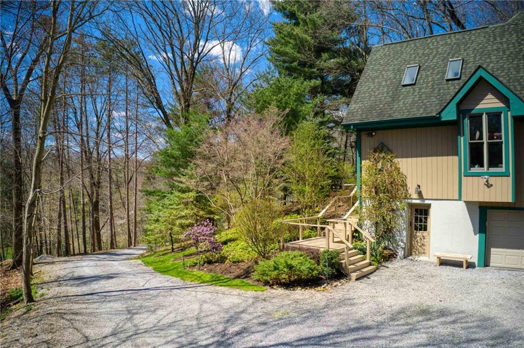 2430 Brandt School Road Wexford, PA 15090 - Photo 20 of 25 a front view of a house with garden