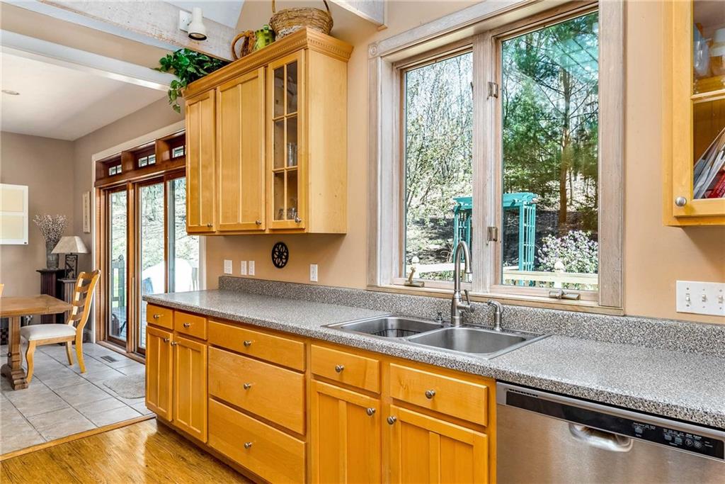 2430 Brandt School Road Wexford, PA 15090 - Photo 8 of 25 a kitchen with stainless steel appliances windows and a sink