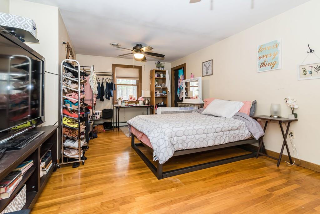 28 Damon Road Ashby, MA 01431 - Photo 24 of 34 a bedroom with a bed and a flat screen tv