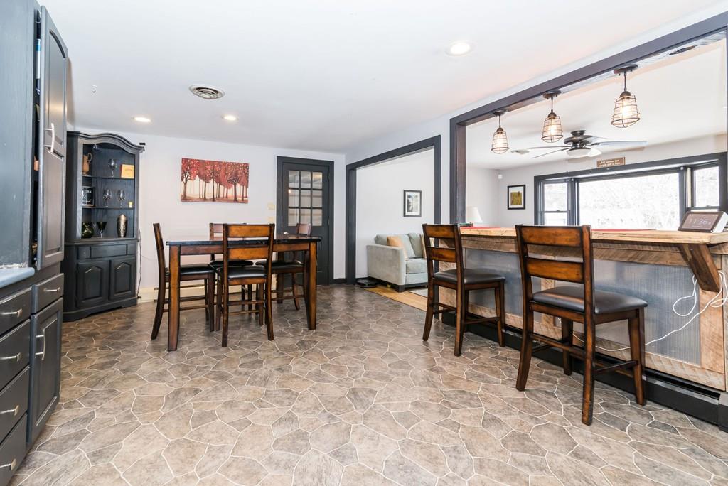 28 Damon Road Ashby, MA 01431 - Photo 6 of 34 a view of dining room with furniture and chandelier