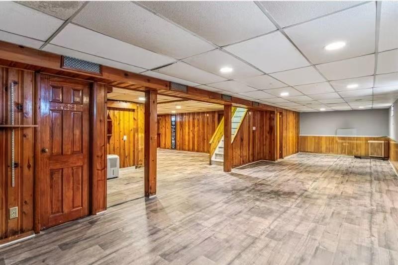 49-75 175th Place Queens, NY 11365 - Photo 18 of 21 a view of an empty room with a window