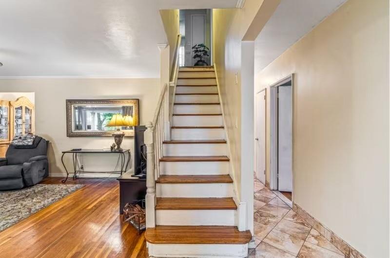 49-75 175th Place Queens, NY 11365 - Photo 4 of 21 a view of a living room and entryway