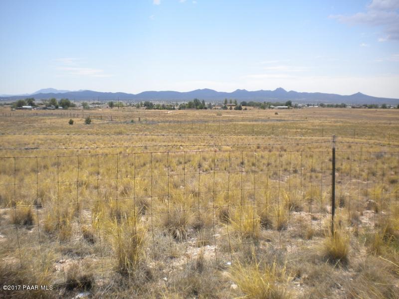 a view of an outdoor space and mountain view in back