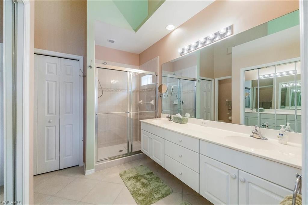 2381 Hidden Lake Court, Unit 8202 Naples, FL 34112 - Photo 27 of 48 Master Bathroom