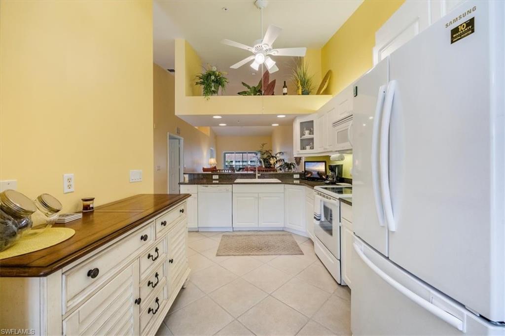 2381 Hidden Lake Court, Unit 8202 Naples, FL 34112 - Photo 7 of 48 Kitchen