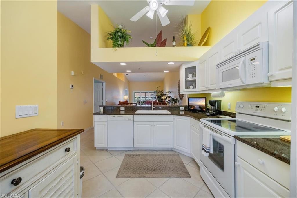 2381 Hidden Lake Court, Unit 8202 Naples, FL 34112 - Photo 8 of 48 Kitchen