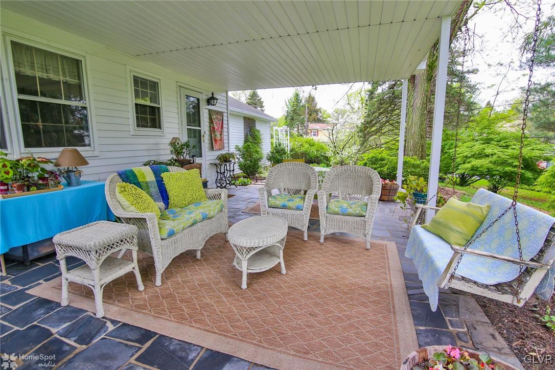 3305 Altonah Road Bethlehem, PA 18017 - Photo 12 of 26 This covered porch with slate tile makes a lovely