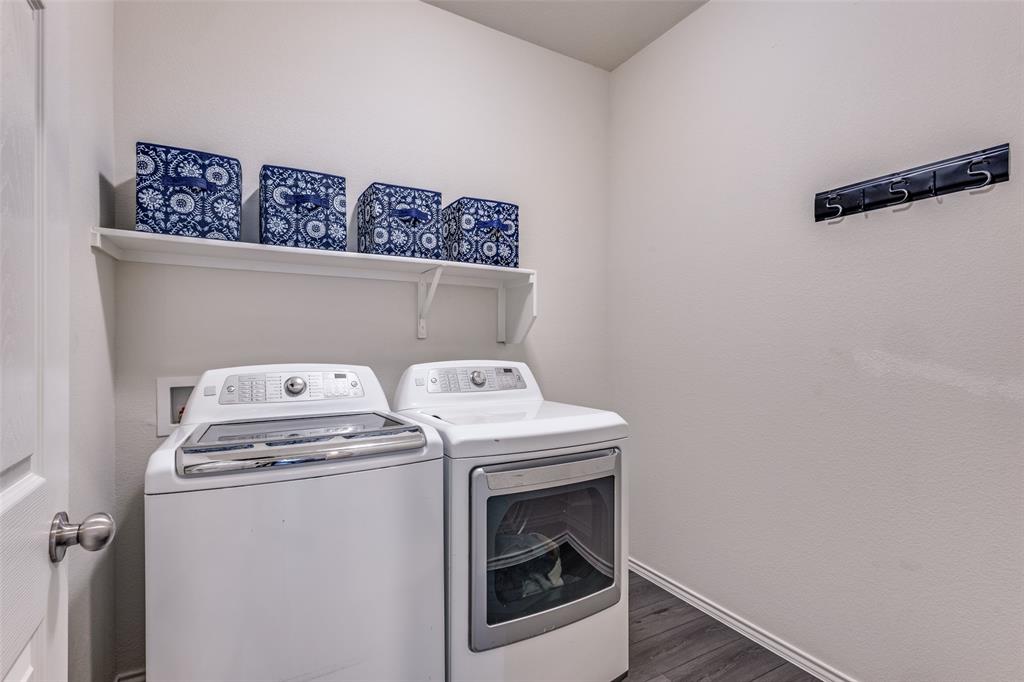 1810 Hummingbird Street Princeton, TX 75407 - Photo 22 of 25 A dedicated laundry room featuring extra space for storage, perfect for supplies, shelving, or seasonal items.
