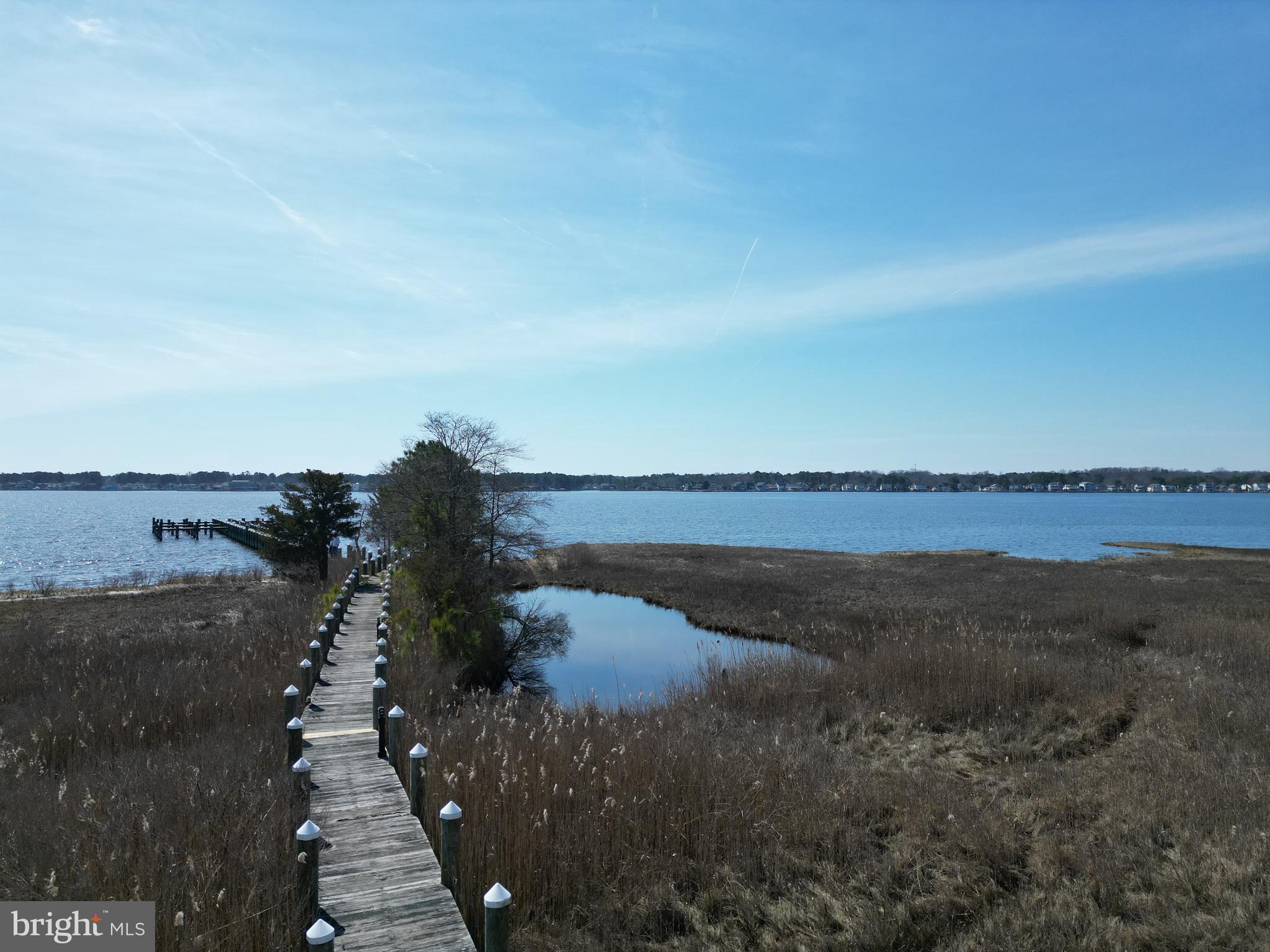 0 St Martins Neck Road Bishopville, MD 21813 - Photo 11 of 15 a view of a lake with a beach