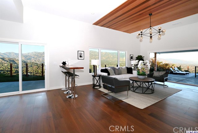 770 Panorama Place Pasadena, CA 91105 - Photo 11 of 35 a living room with furniture a window and a table