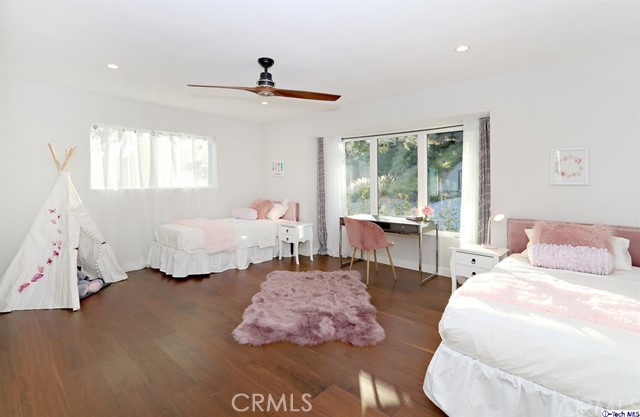 770 Panorama Place Pasadena, CA 91105 - Photo 17 of 35 a bedroom with bed and a large window