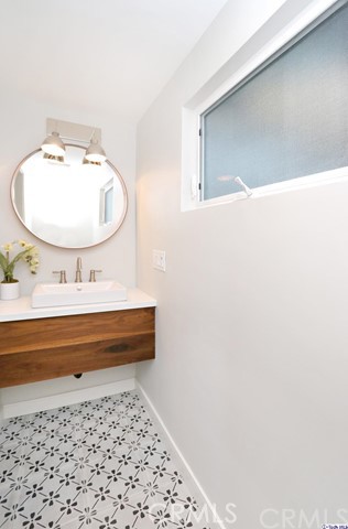 770 Panorama Place Pasadena, CA 91105 - Photo 20 of 35 a bathroom with a sink and a mirror