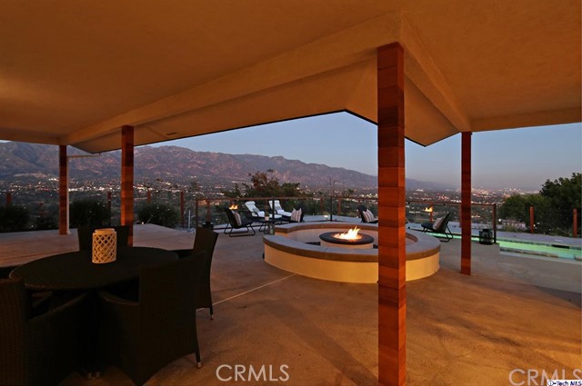 770 Panorama Place Pasadena, CA 91105 - Photo 23 of 35 a view of a patio with a table and chairs
