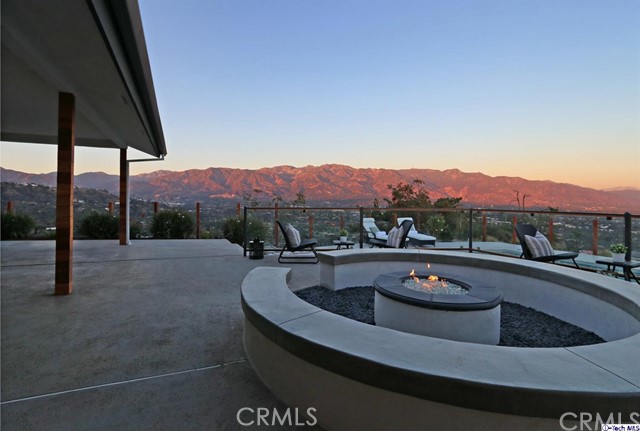 770 Panorama Place Pasadena, CA 91105 - Photo 24 of 35 a view of a terrace with a table and chairs