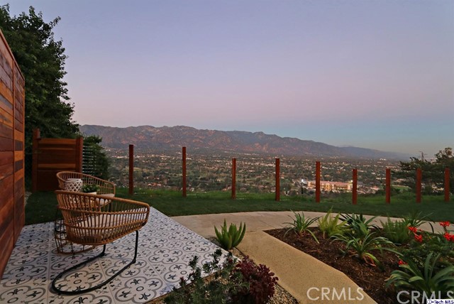 770 Panorama Place Pasadena, CA 91105 - Photo 27 of 35 a view of a chairs and table in patio with a lake view
