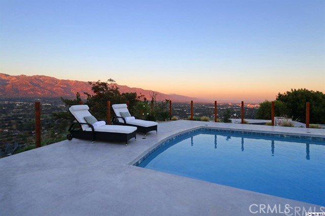 770 Panorama Place Pasadena, CA 91105 - Photo 29 of 35 a view of a swimming pool with a yard and a fire pit