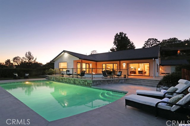 770 Panorama Place Pasadena, CA 91105 - Photo 31 of 35 a view of a swimming pool with a patio